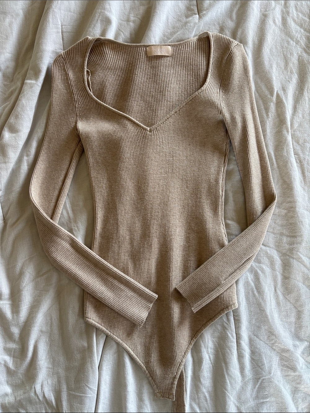 nuuds Ribbed Long Sleeve V-Neck Bodysuit in Beige